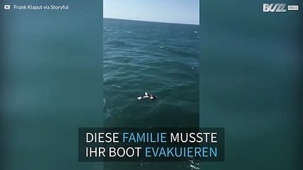 Download Video: Familie auf hoher See gerettet, nachdem Boot Feuer fing