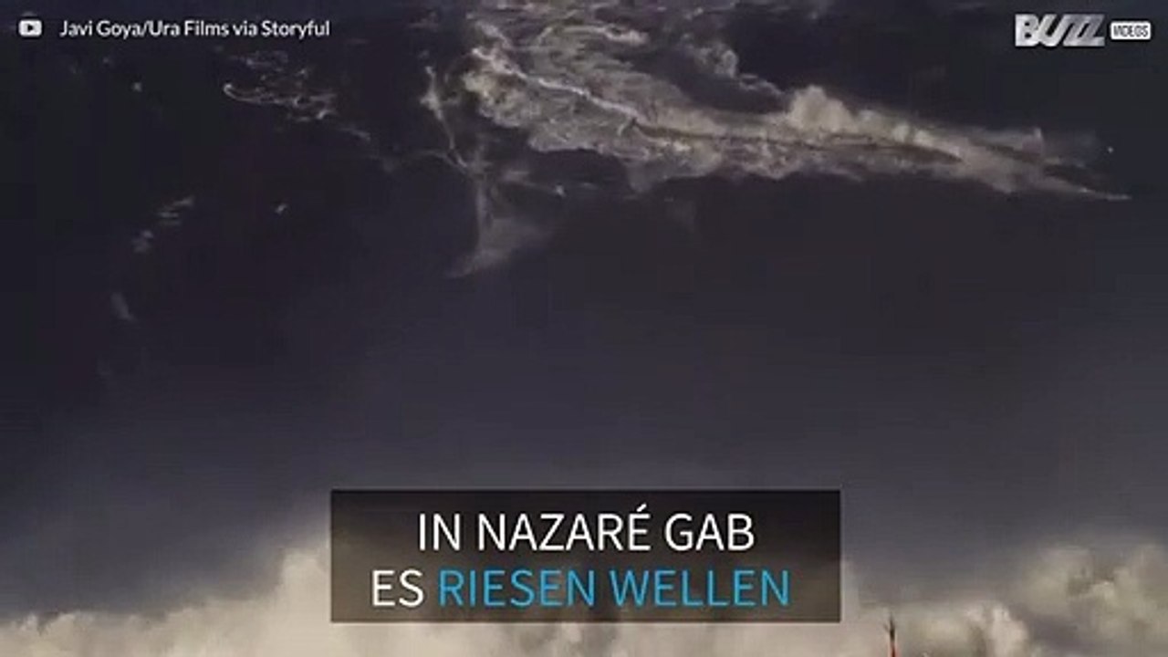 Sebastian Steudtner surft auf einer riesen Welle in Nazaré