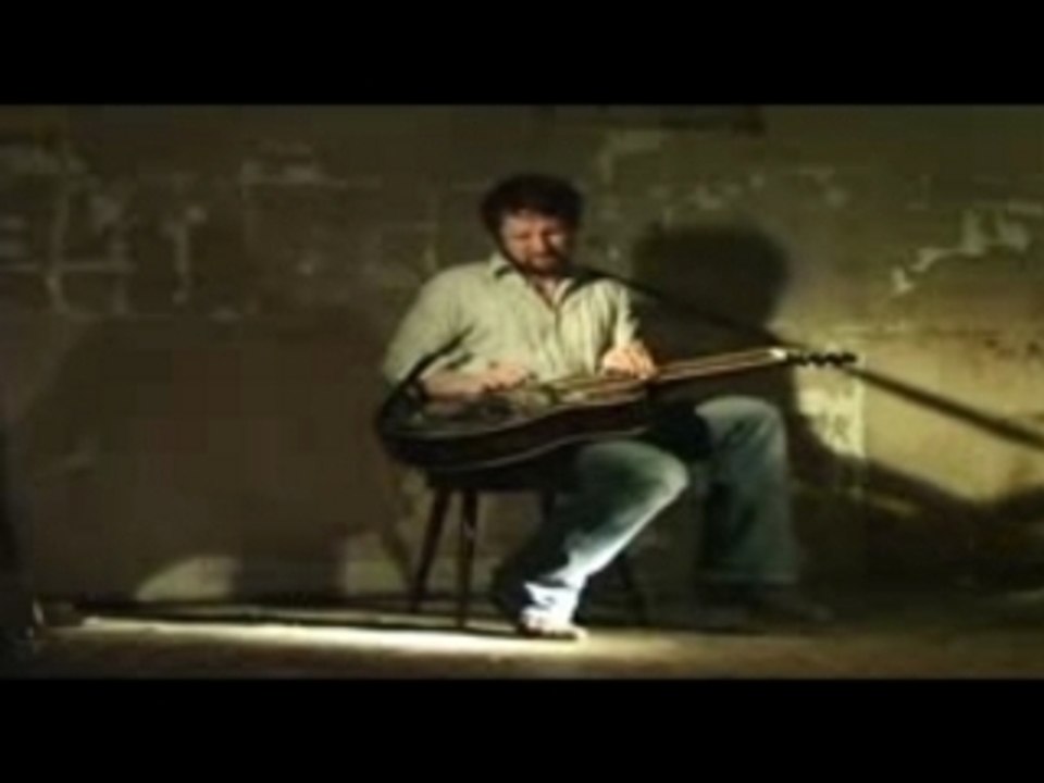 Naughty Jack, blues / folk dobro player, singing Work