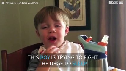 Little boy doesn't know whether to sleep or to eat