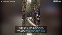 Parisians practice wakeboarding in flooded city