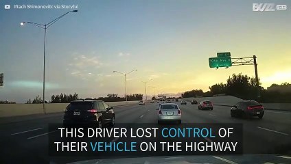 Driver makes unbelievable recovery after skidding out of control on highway