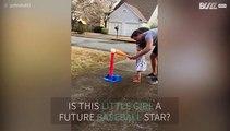 Girl swings baseball in camera's face!