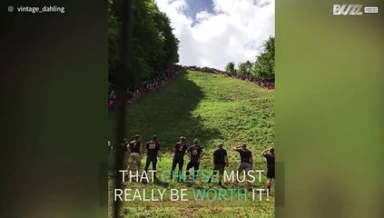 People throw themselves down a hill for... cheese!