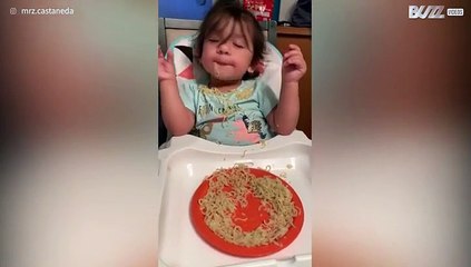 Little girl falls asleep eating spaghetti