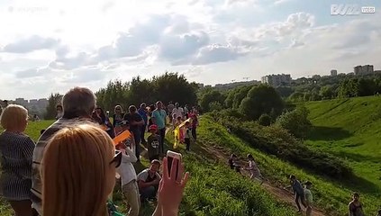 Child takes paper plane full in the face!
