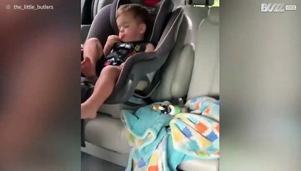 Boy can't decide between eating or sleeping!