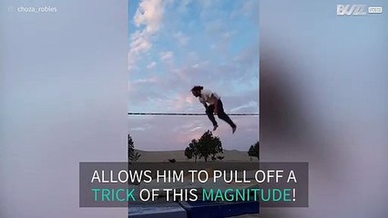 Slackline pro pulls off most difficult trick