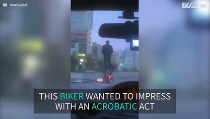 Biker fails risky acrobatics act