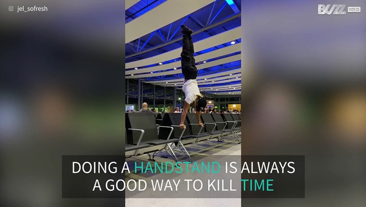 Passenger does handstand at Heathrow airport