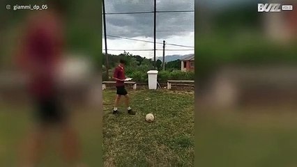 Youngster casually flicks football in garbage bin with amazing trick shot