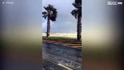 Storm whips up a lather leaving Cape Town streets covered in foam