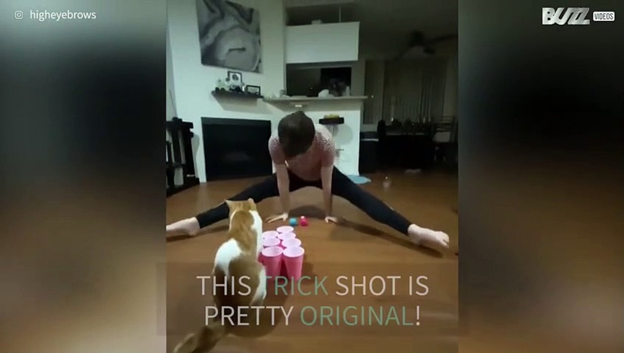 Cat helps gymnast pull trick shot