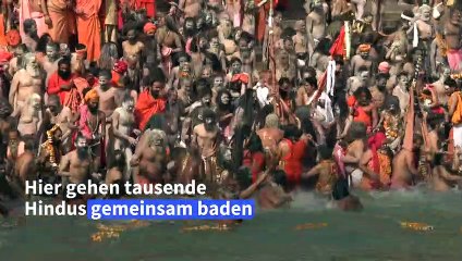 Inder gehen massenweise im Ganges baden