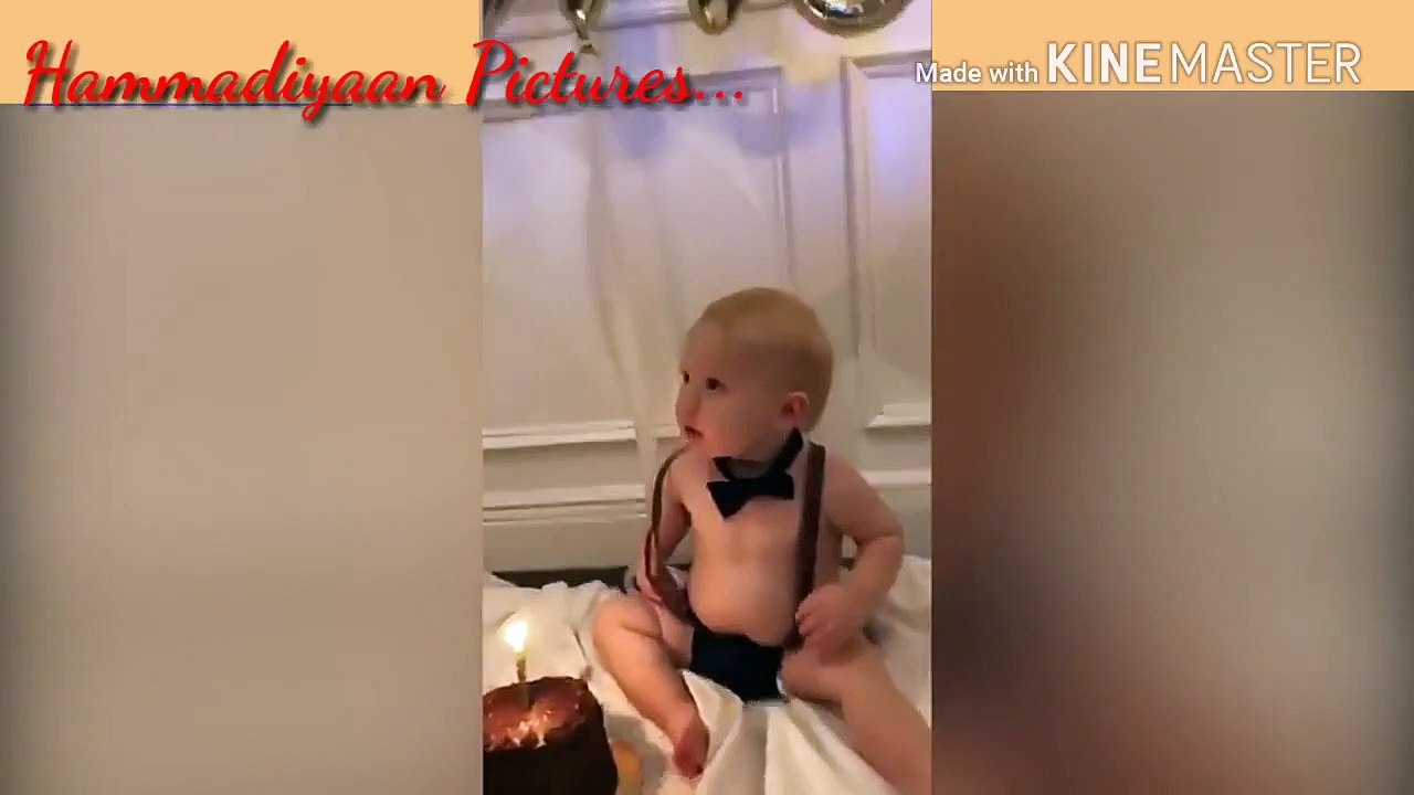 Birthday boy bursts into tears after dad blows out his first candleSat in a pair of shorts suspend