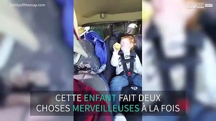 Une petite fille s'endort en mangeant sa pomme