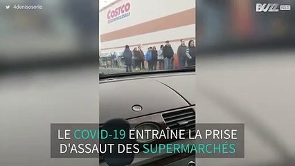Covid-19: les achats paniquent entraînent des files interminables