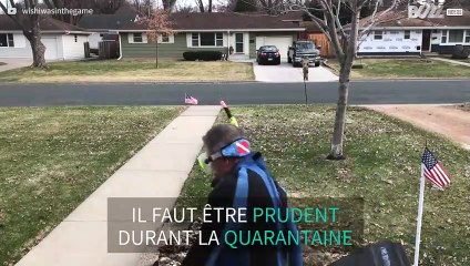 Confiné, il sort les poubelles en combi de plongée