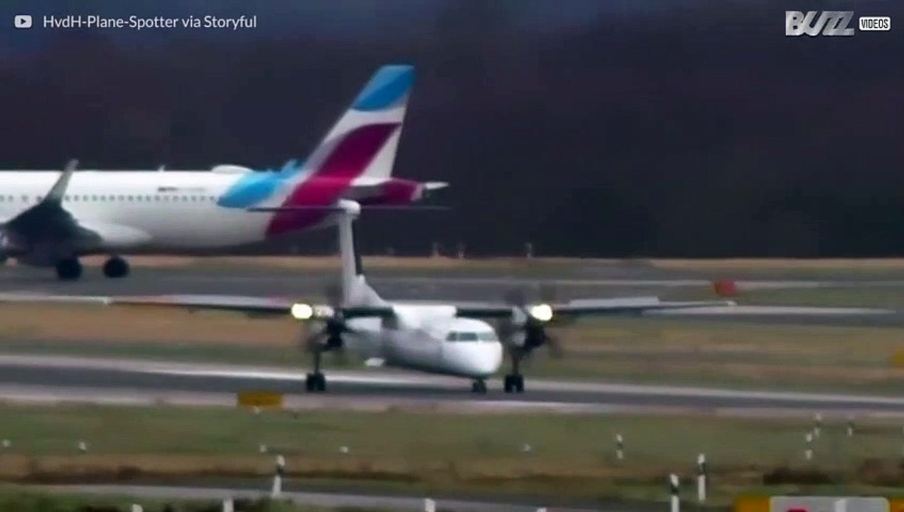 ドイツで大嵐の中揺られながら着陸を試みる飛行機