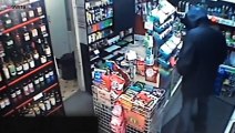 Female corner shop worker confronts a knifeman with her own blade