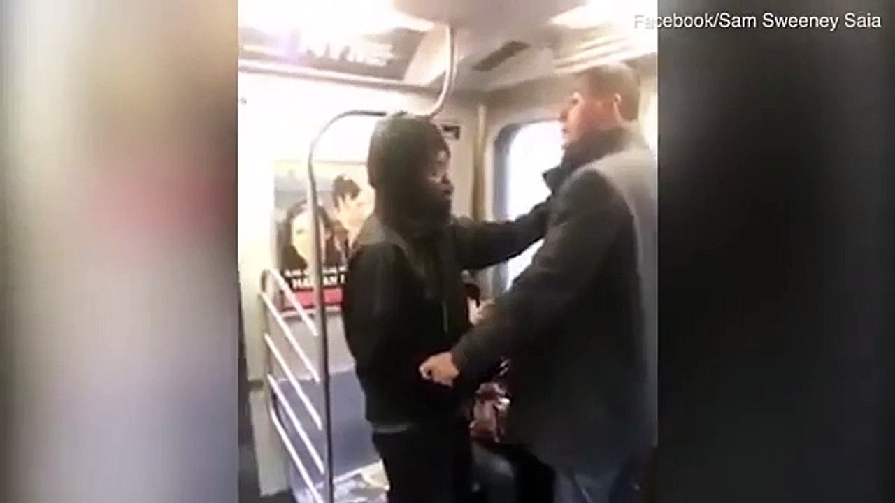 Hero forces man off subway after punching woman in the face