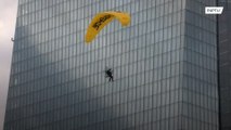 Greenpeace activists on paragliders land on ECB building in climate protest