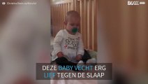 Baby vecht tegen de slaap... en de slaap wint