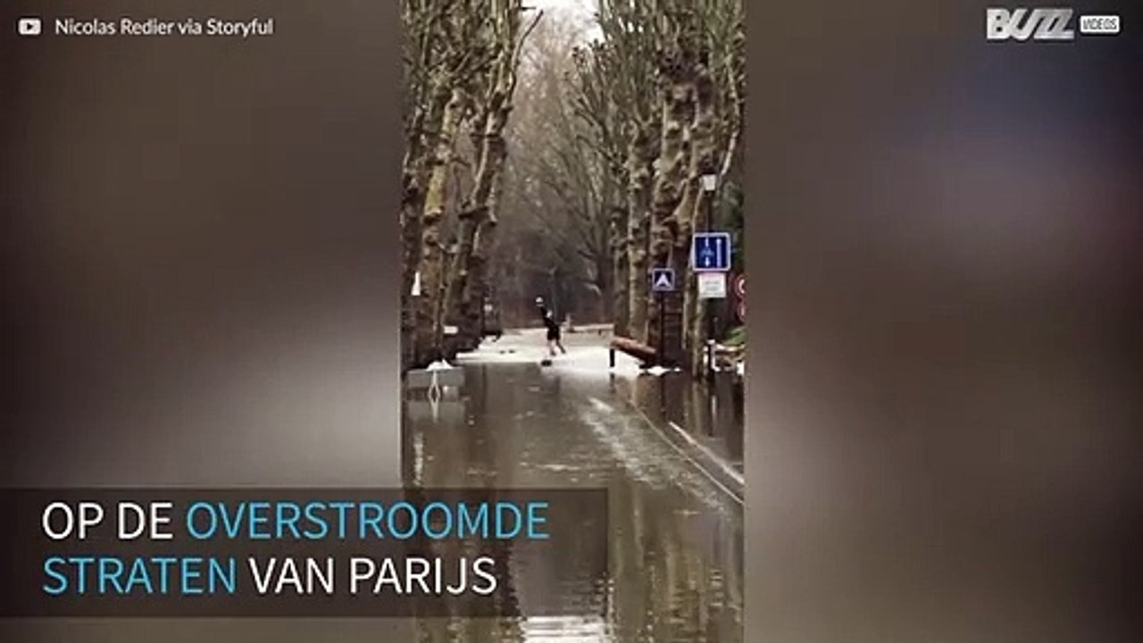 Parijzenaren wakeboarden in overstroomde stad