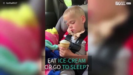 Kid dozes off while eating ice-cream