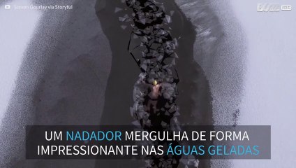 Nadador mergulha em lago congelado nas Terras Altas da Escócia