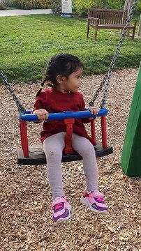 my 2y old daughter enjoying swing.