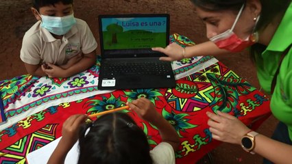 Teacher canoes to isolated indigenous communities in Panama