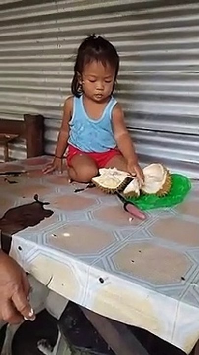 my son eating durian
