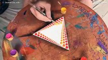 Artista usa gotas de tinta para fazer obras impressionantes