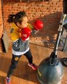 Boy Shows Incredible Boxing Skills While Practicing With Punching Stand Box