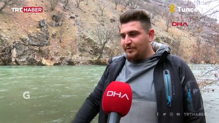 Köpeği kurtarmak için eksi 2 derecede buz gibi suya girdi