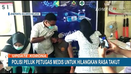 Polisi Peluk Petugas Medis agar Hilangkan Rasa Takut saat Vaksinasi Covid-19