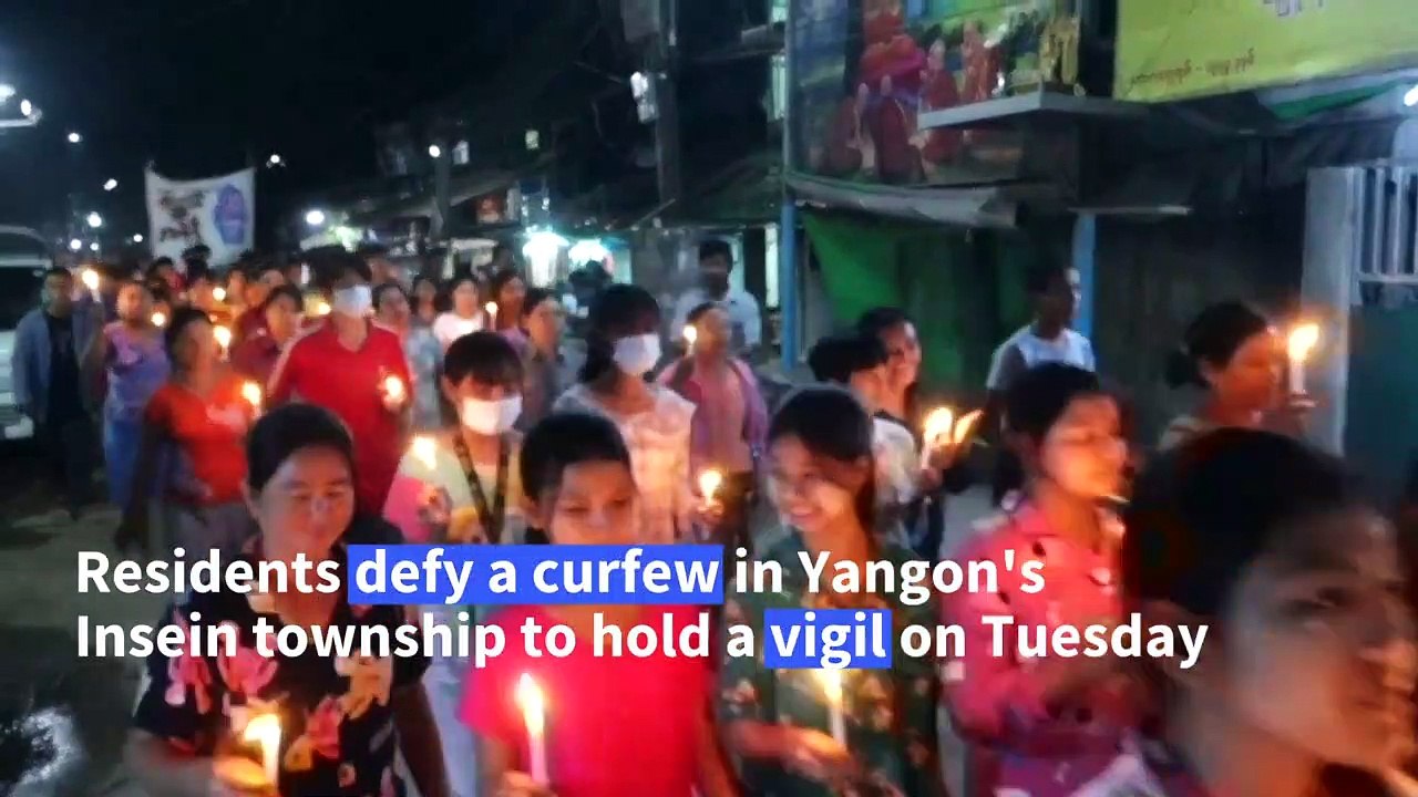 Myanmar township residents march with candles to honour those killed