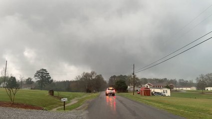 Tornado passes in front of truck in Alabama
