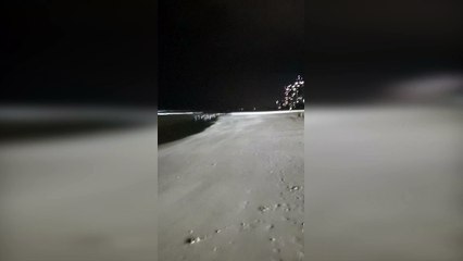 Strong Winds Blow Sand Along Beach Surface