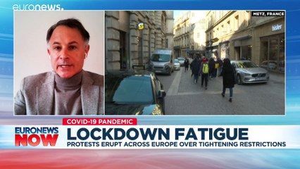 Lockdowns are 'not going to be over by summer' says global health expert