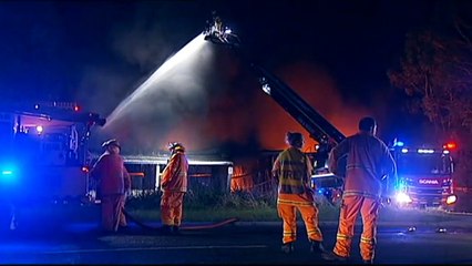 Fire crews have contained a large fire in Brisbane