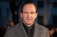 Ralph Fiennes has defended JK Rowling