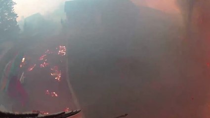 Forest fire threatening homes caught on camera