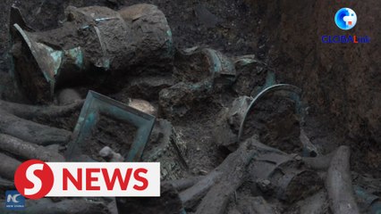 Digging through history, dirt at Sanxingdui Ruins in China
