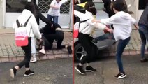 Genç kızı sokak ortasında yere yatırıp tekme tokat dövdüler! Dehşet veren o anlar kamerada