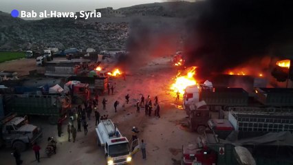 Smoke billows after bombardment hits fuel depot in northern Syria