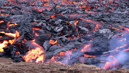 Visitors gather as Icelandic volcano subsides following eruption