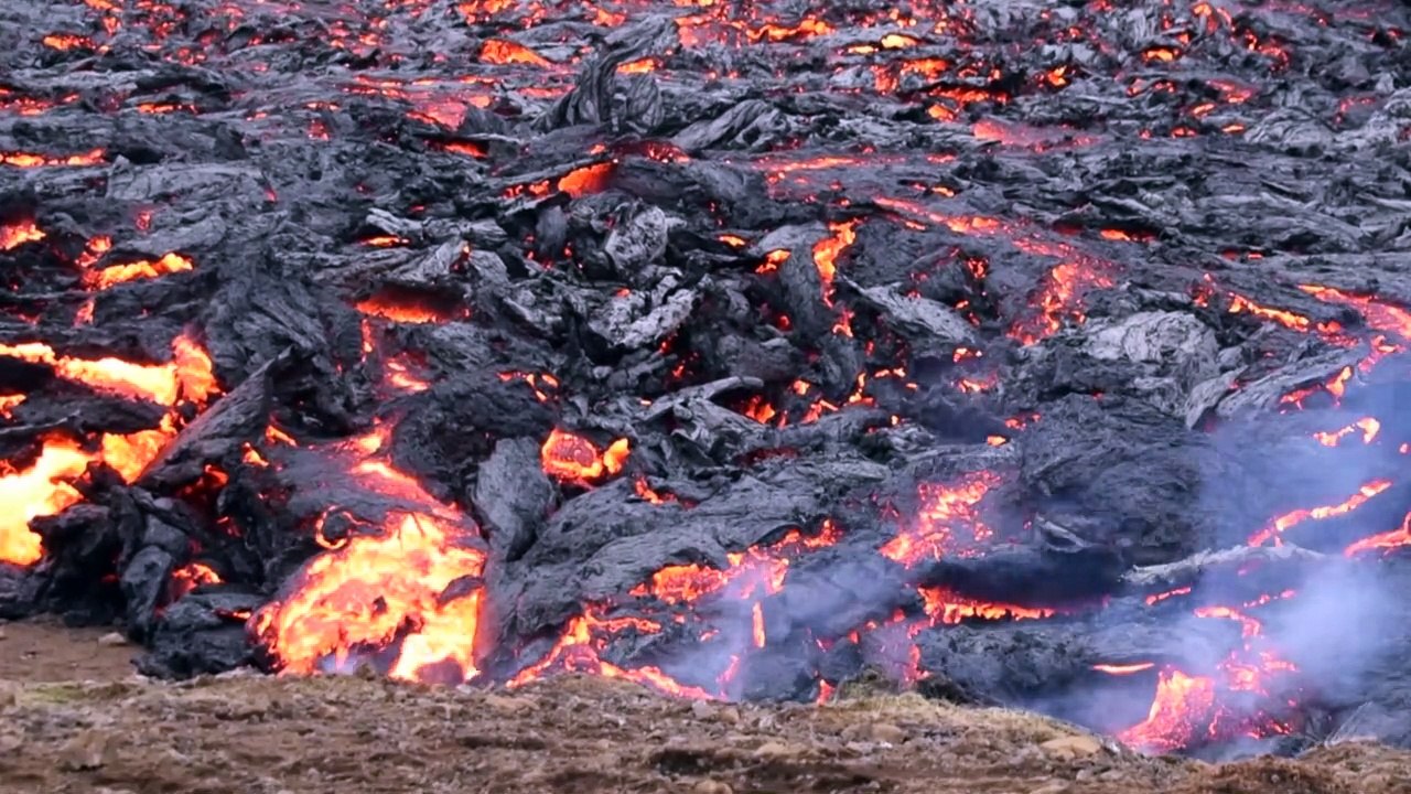 Visitors gather as Icelandic volcano subsides following eruption