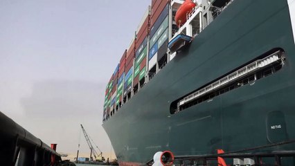The Ever Given is freed from one of the banks of the Suez Canal.